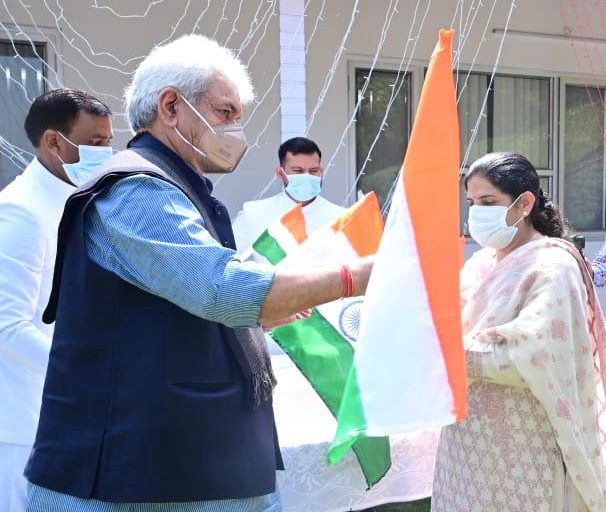 The Lieutenant Governor launches the Har Ghar Tiranga campaign and distributes national flags to Raj Bhawan staff to pay tribute to martyrs and freedom fighters